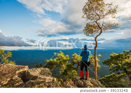Photographer on top of mountain Photographer on top of mountain 39133248