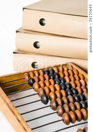 Old abacus and folders with documents, close-up  39135643