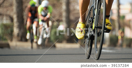 Cycling competition,cyclist athletes riding a race 39137284