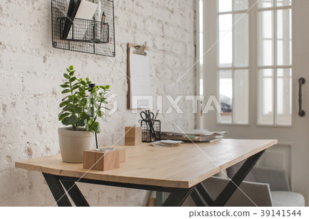 Wooden working table in home office 39141544