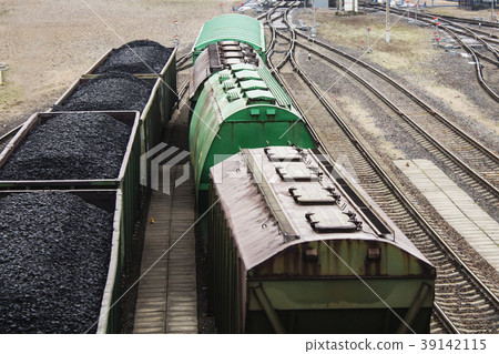 Aerial view on wagons with black coal. 39142115
