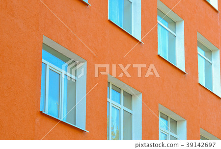 Facade building with pink walls Facade building with pink walls 39142697