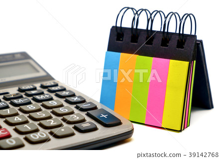 Calculator and colourful paper sticky note 39142768
