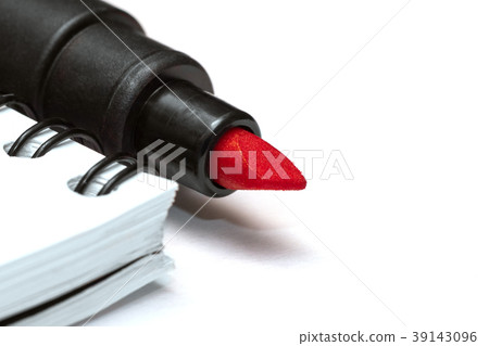 Red marker near a blank notebook Red marker near a blank notebook 39143096