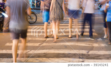 Blurred motion of cars and people on the Blurred motion of cars and people on the 39143241