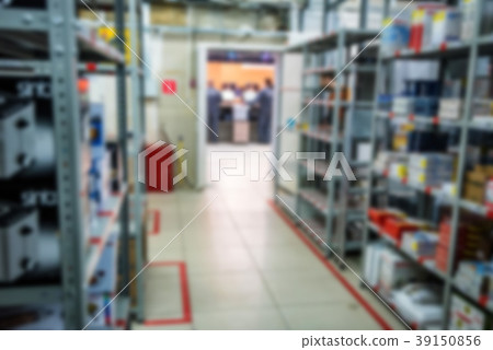 Blurred interior of hardware shop storage 39150856