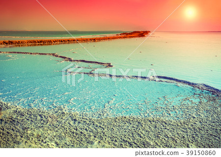 Dead sea salt shore at sunrise Dead sea salt shore at sunrise 39150860