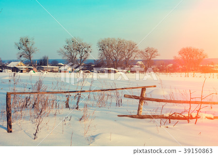 Snowy rural landscape with wooden fence in winter Snowy rural landscape with wooden fence in winter 39150863