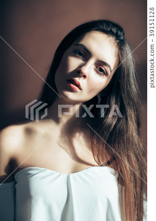 sensual woman portrait on brown background 39151128