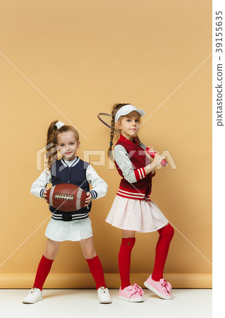 Two happy and beautyful children show different Two happy and beautyful children show different 39155635