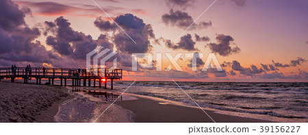 Panorama of a beach sunset over Baltic sea Panorama of a beach sunset over Baltic sea 39156227