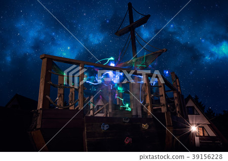 Colorful lighttrails on a deck of a pirate ship 39156228
