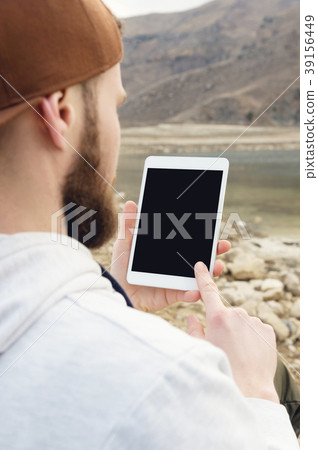 Close-up of a horde in a brown cap in the open air Close-up of a horde in a brown cap in the open air 39156449