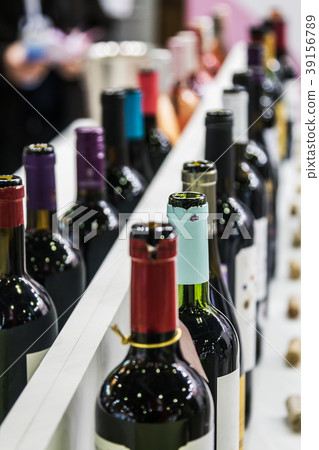 bottles of wine on the counter tasting or store 39156789