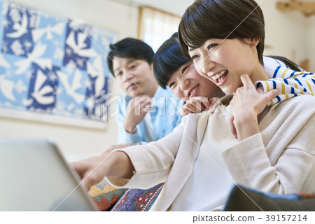 Family, computer and sofa 39157214