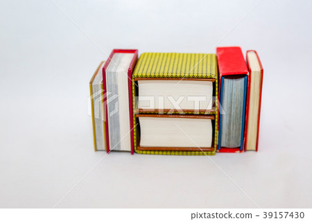 Stack of small books in hard cover 39157430