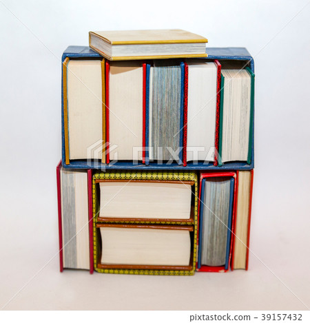 Stack of small books in hard cover 39157432