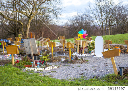 Wooden tablets on graves in a german cemetry Wooden tablets on graves in a german cemetry 39157697