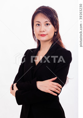 Asian businesswoman in suit looking at camera Asian businesswoman in suit looking at camera 39163230