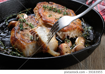 Roasted pork steak in frying pan Roasted pork steak in frying pan 39163955