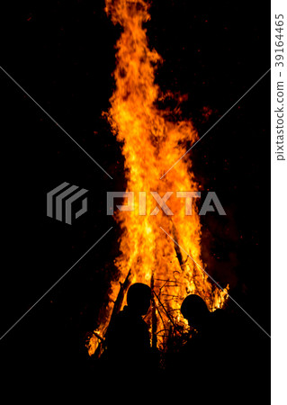 Whispering in front of the big ritual fire Whispering in front of the big ritual fire 39164465