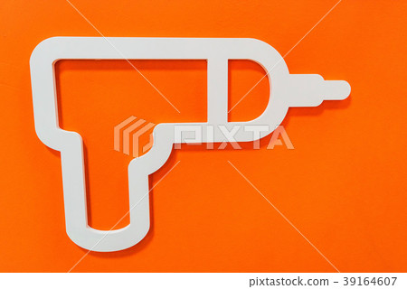 Drill icon on wall in house appliances store Drill icon on wall in house appliances store 39164607