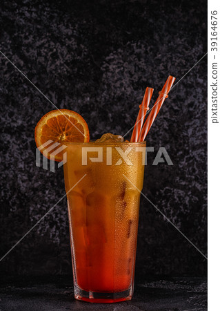 Juicy Orange and Red Tequila Sunrise with ice 39164676