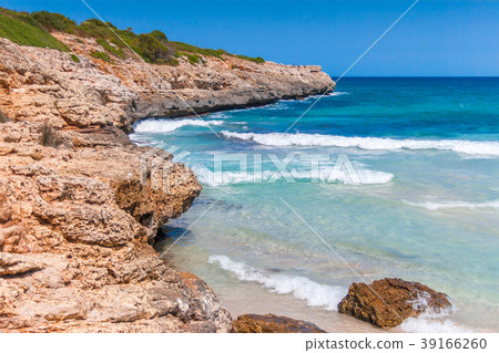 Turquoise sea at the rocky coast of Mallorca. 39166260