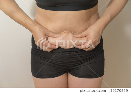 Woman's stomach before dieting 39170239
