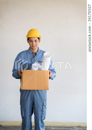 Asian technician man smiling with safety helmat. 39170507