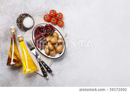 Grilled octopus with small potatoes Grilled octopus with small potatoes 39172092