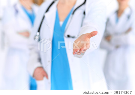 Group of medicine doctors offering helping hand 39174367