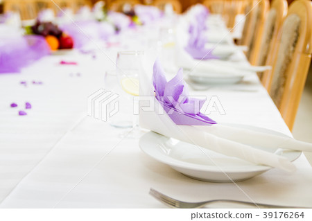 Violet wedding or reception table ready for meal 39176264