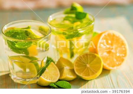 Lemonade or mojito cocktail with lemon and mint 39176394
