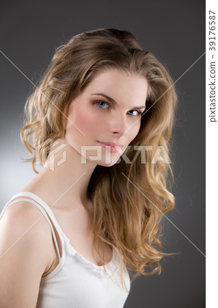 Portrait of beautiful blonde woman with great hair Portrait of beautiful blonde woman with great hair 39176587