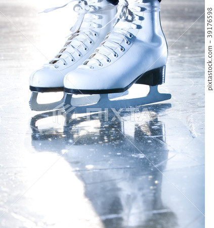 Dramatic blue portrait shot of ice skates Dramatic blue portrait shot of ice skates 39176598