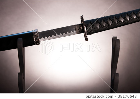 Katana on stand with partially drawn blade, Katana on stand with partially drawn blade, 39176648
