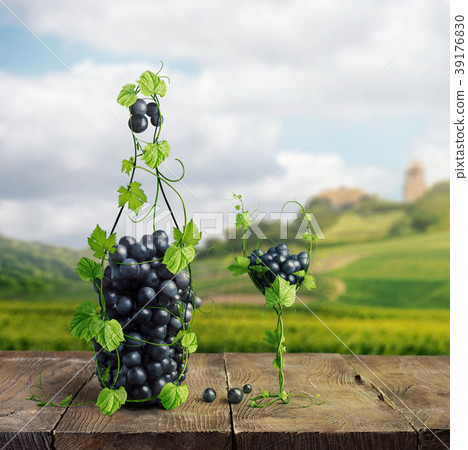 A glass and a bottle of wine made by of grape A glass and a bottle of wine made by of grape 39176830