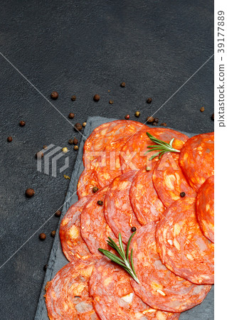 Italian Salami or spanish chorizo on serving board 39177889