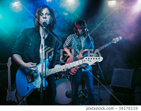 Performance of the rock band. 39178119