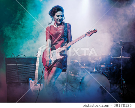 Performance of the rock band. 39178125