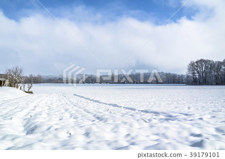 Winter landscape with snow field in countryside Winter landscape with snow field in countryside 39179101