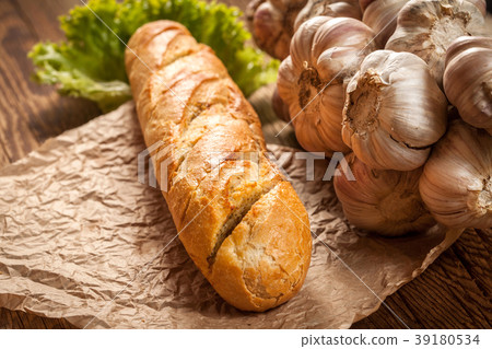 Garlic baguette. Garlic baguette. 39180534
