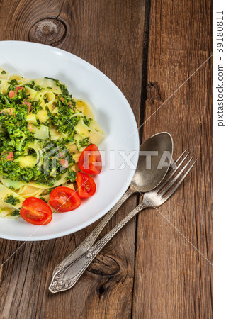 Spaghetti with spinach and bacon. Spaghetti with spinach and bacon. 39180811