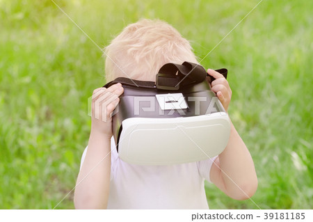 Little boy in a virtual reality helmet 39181185
