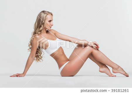 Girl in lingerie on white background 39181261