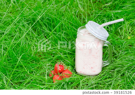 Mug of yogurt and strawberry 39181526