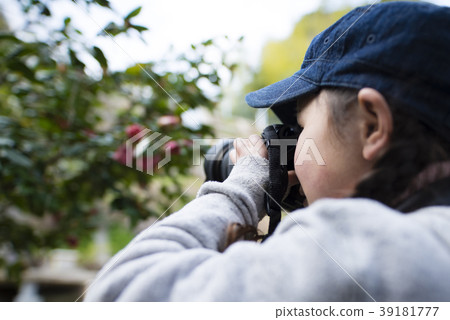 Girl taking a picture Girl taking a picture 39181777