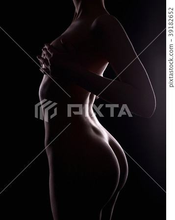 Female Nude Silhouette in Dark. Young Sexy Woman 39182652