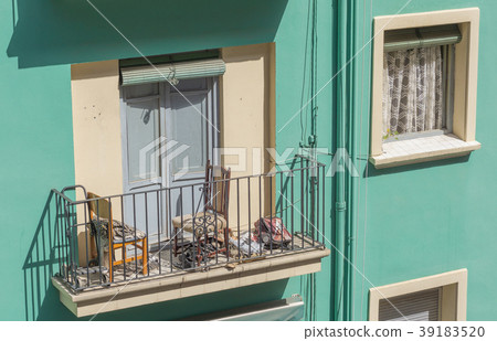 balcony and window of an old housing building with 39183520